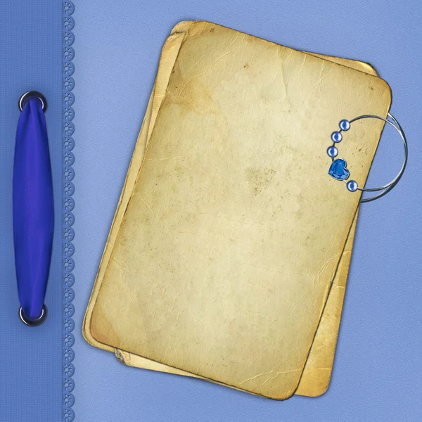 Старий папір з діамантом і синьою стрічкою — стокове фото