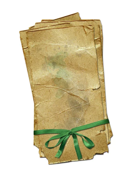 Гранж-бумага с зеленым бантом для дизайна — стоковое фото