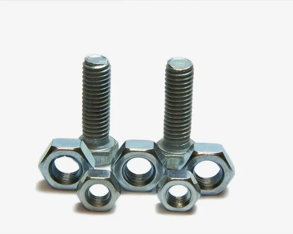 Two head bolts and Five screw nuts — Stock Photo, Image