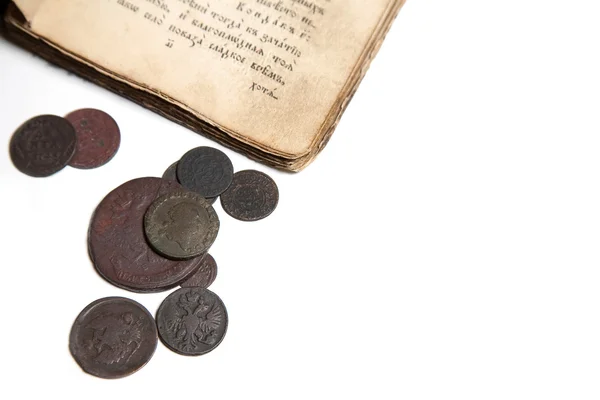 Old book and coins — 스톡 사진