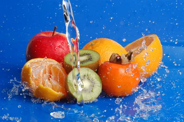 Water drops around fruits — Stock Photo, Image