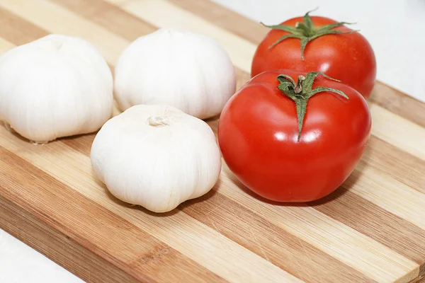 Tomates y ajo — Foto de Stock