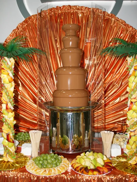 Chocolate fondue fountain — Stock Photo, Image