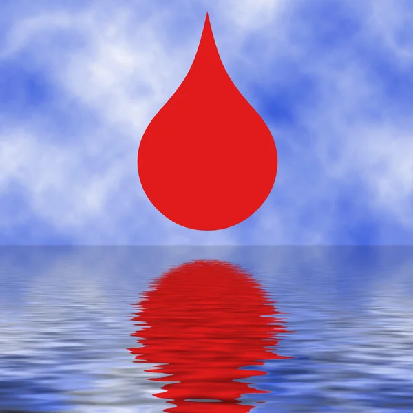 Röd droppe i havet — Stockfoto