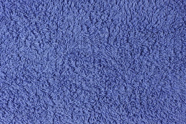 Slighty worn purple towel — Stock Photo, Image