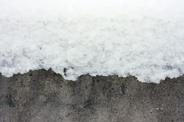 stock image Snow over concrete wall