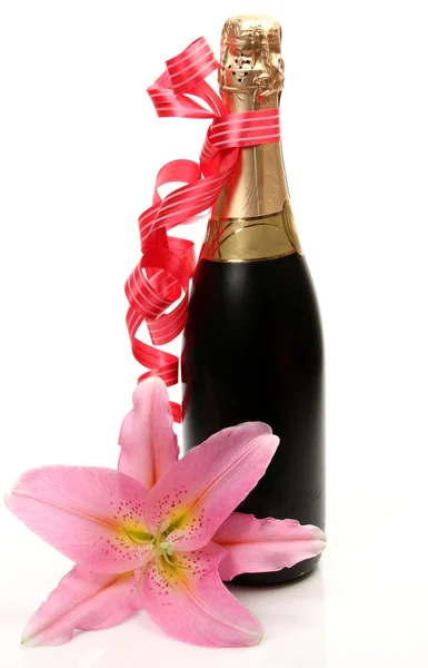 Bottle and flower — Stock Photo, Image
