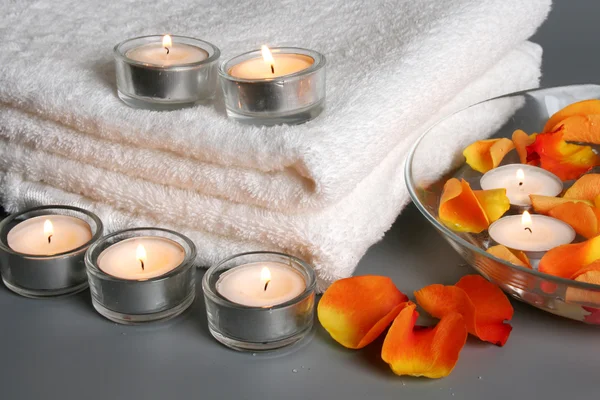 Candles and a towel — Stock Photo, Image