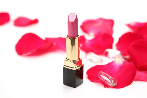 Petals of roses and lipstick Royalty Free Stock Photos