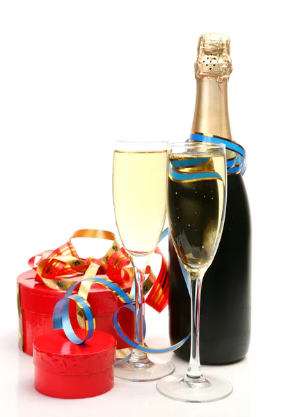 Champagne and gifts — Stock Photo, Image
