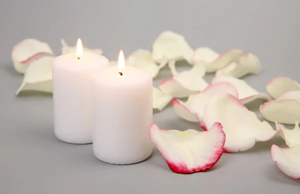 stock image Candles and petals of roses