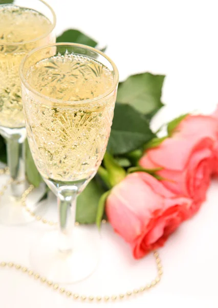 Rosa rosor och champagne — Stockfoto