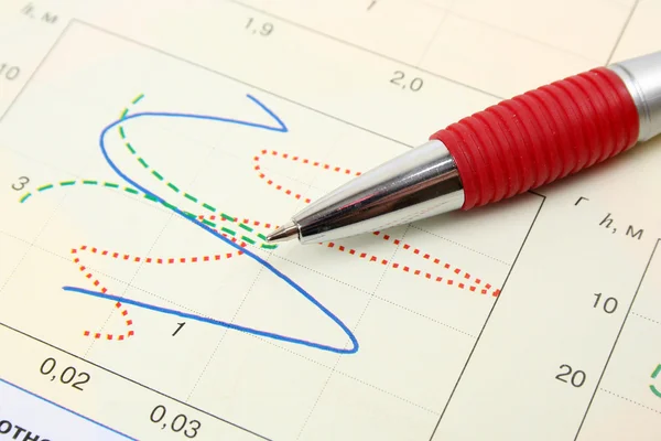 Ручка и диаграмма — стоковое фото