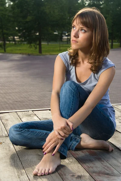 stock image Teenage girl is sitting