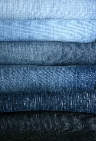 Jeans combined in a pile — Stock Photo, Image