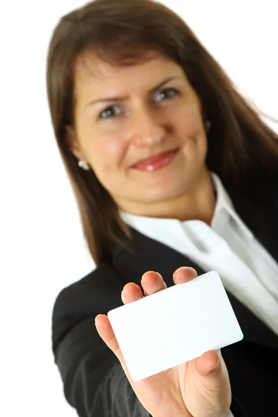 Business woman holds a business card — Stock Photo, Image