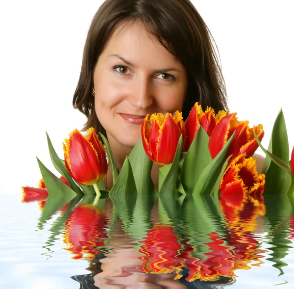Kobieta z bukietem tulipanów — Zdjęcie stockowe