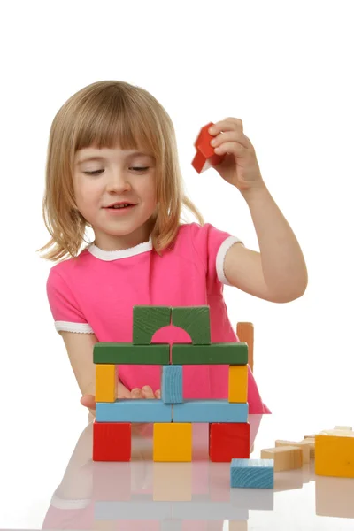 stock image Little girl playing with cubes