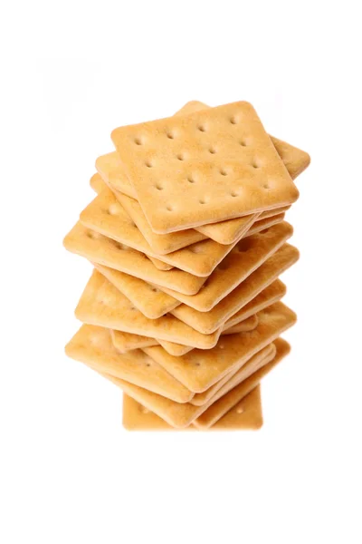 Haufen Cracker isoliert auf weiß — Stockfoto