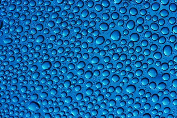 水の青い滴 ロイヤリティフリーのストック画像