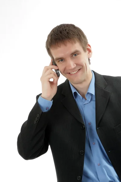 Amistoso hombre de negocios habla por teléfono —  Fotos de Stock