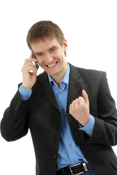 Дружній бізнесмен говорить по телефону — стокове фото