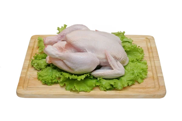 Kyckling på en skärbräda — Stockfoto
