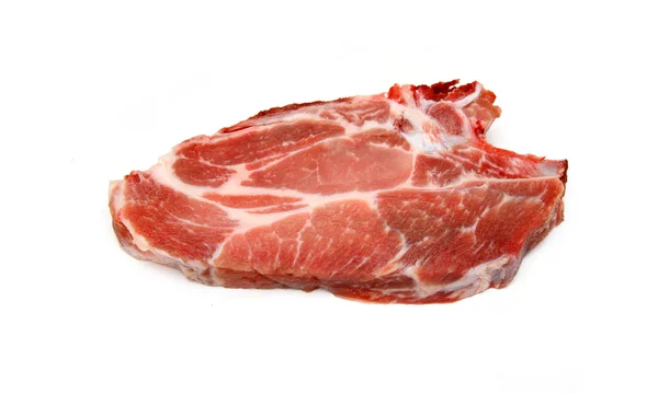 Свежий стейк из свинины — стоковое фото