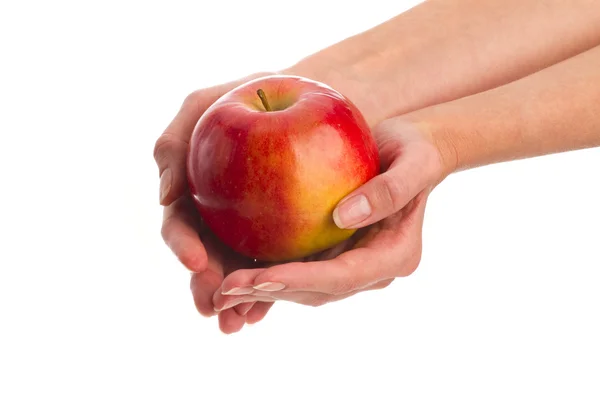 Apple in hands — Stock Photo, Image