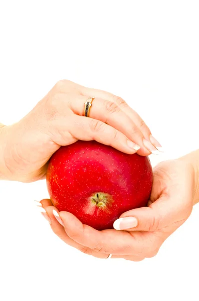 Rode appel in de hand — Stockfoto