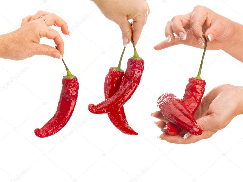 Peppers in hand isolated