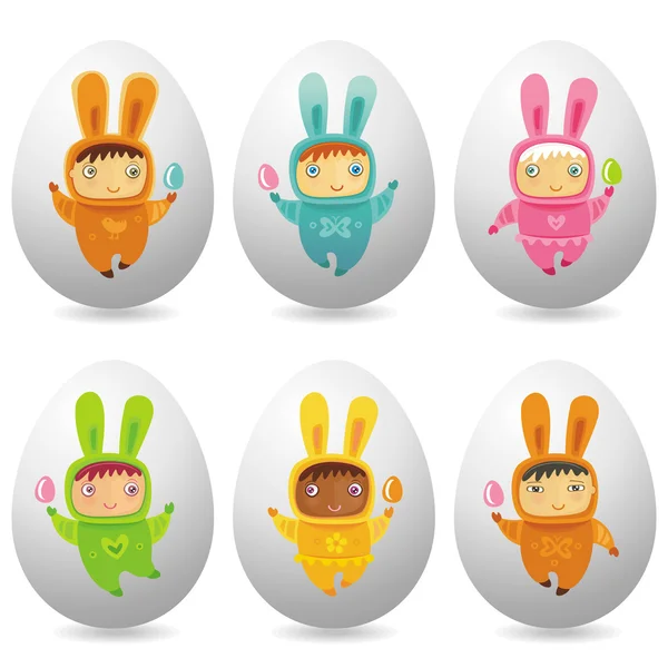 Sevimli küçük bebekler ile Paskalya yumurtaları — Stok fotoğraf