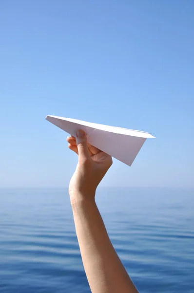 Házet papírové letadlo — Stock fotografie