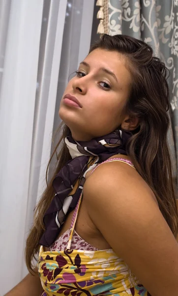 Portrait of the young girl with a scarf — Stock Photo, Image