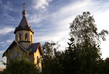 Orthodox chapel on a evening sky backgr clipart