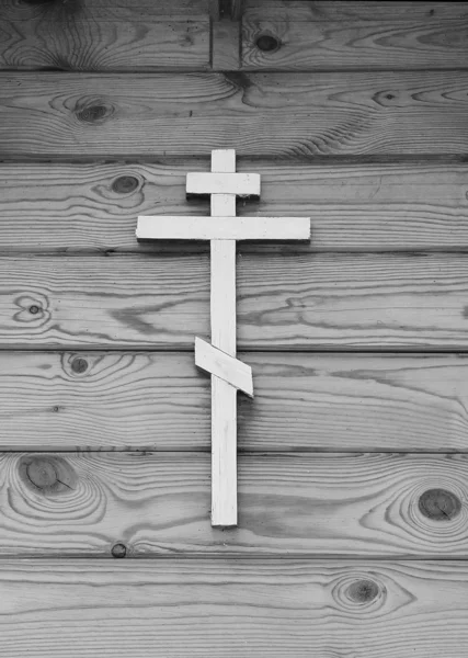 Orthodox cross on a wall of a rural chap — Stock Photo, Image