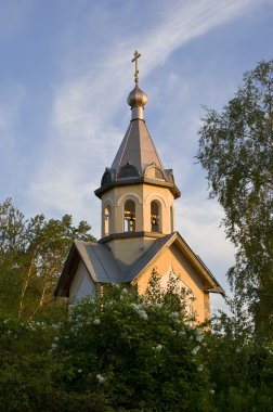 Orthodox chapel on a evening sky backgro clipart