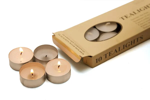 Flaming tealights in the box — Stock Photo, Image