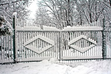 Gates covered with snow clipart