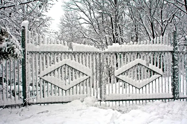 Gates covered with snow — Stock Photo, Image