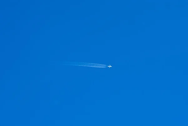 stock image Aircraft trace in blue sky