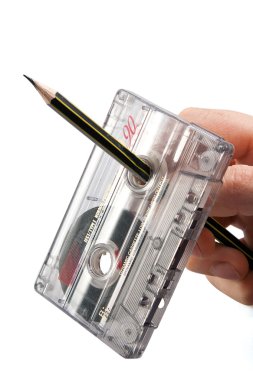 Rewind of vintage cassette with pencil clipart