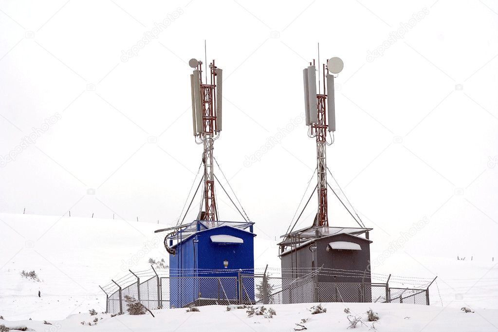 Two GSM towers in winter