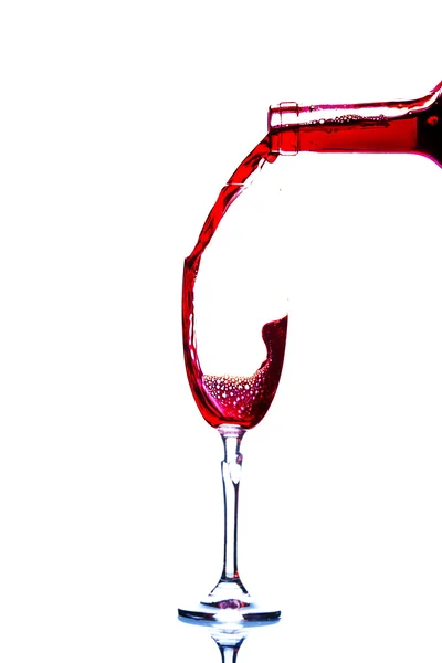 Wine splash in the glass — Stock Photo, Image