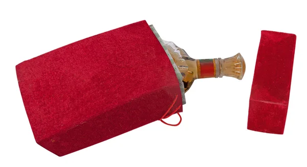 Butelka w czerwonym welurowym pudełku — Zdjęcie stockowe
