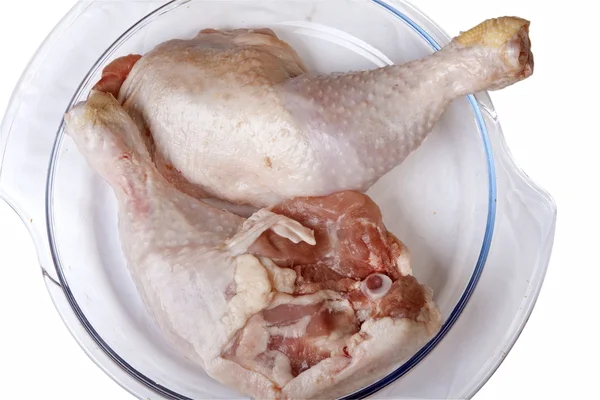 Hen legs on glass dish — Stock Photo, Image