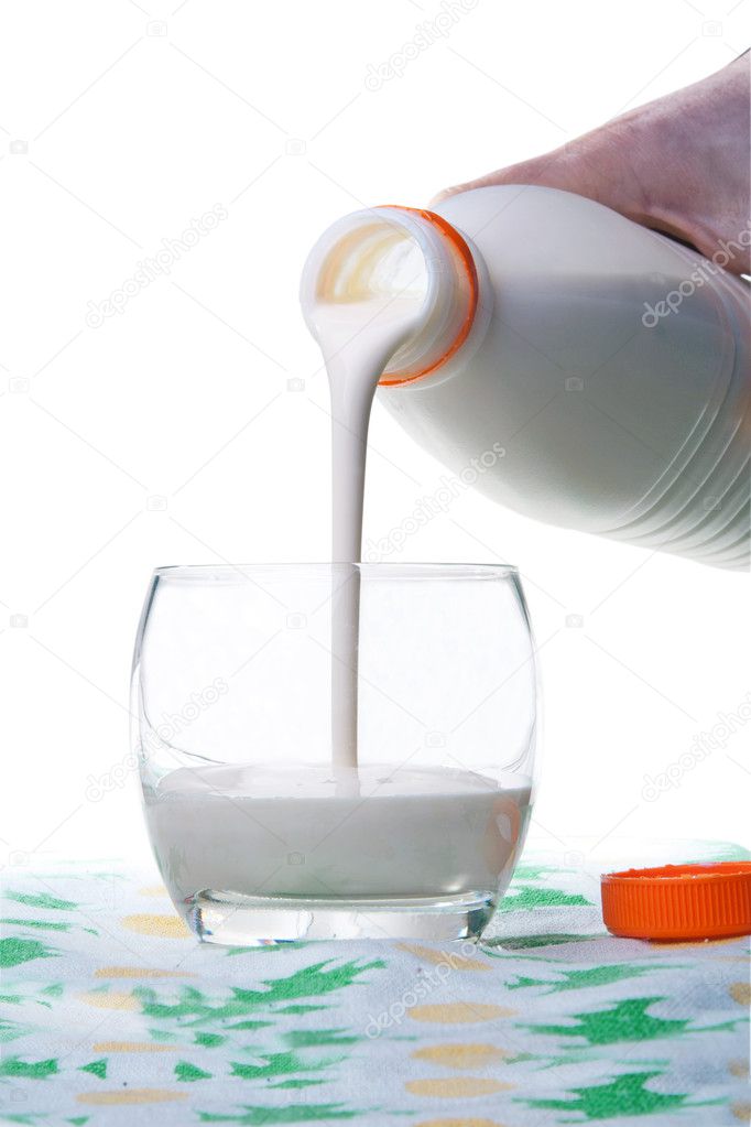 Flowing milk from bottle