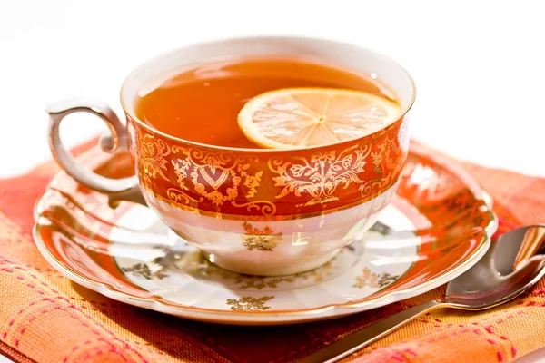 Tasse Tee, rotes Stillleben — Stockfoto