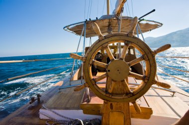 Yacht journey, steering wheel