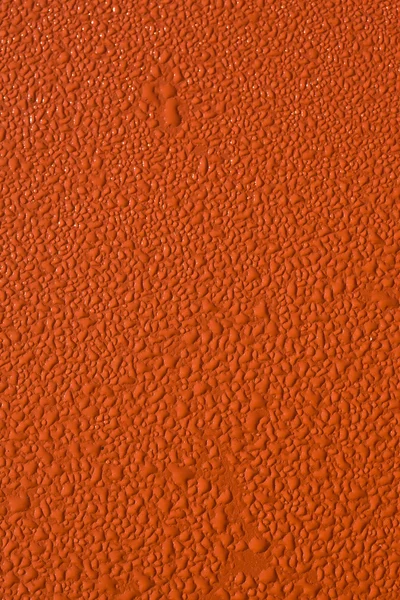 Апельсиновая текстура с капли — стоковое фото